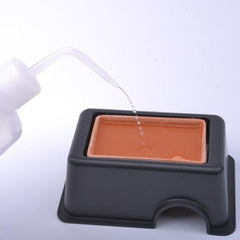 plastic hide with water dish (17.5 X 11.5 X 7.1)